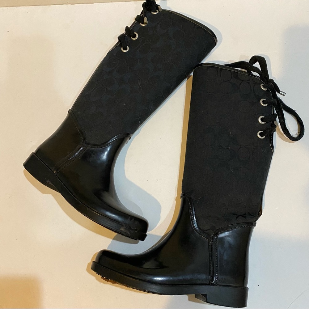 Worn once black coach rain boots with lace up back